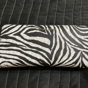Michael Kors Large zip around wallet. Zebra print